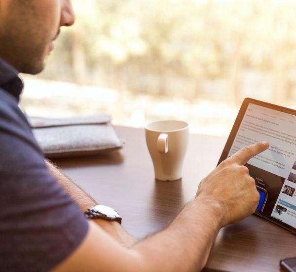 man holding tablet computer